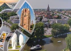ein Fluss und eine Kirche in Leeuwarden mit kleinen Ausschnitten von der Stadt