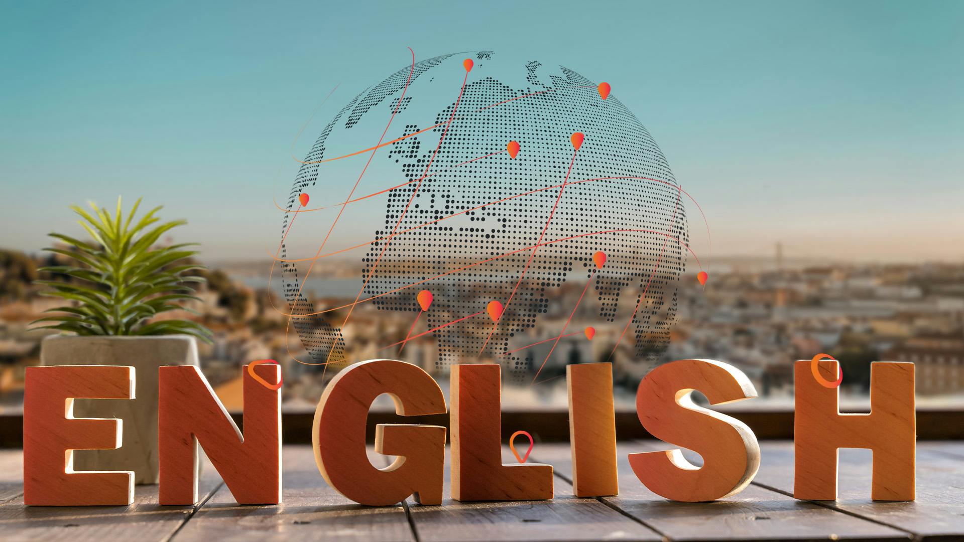 Holzbuchstaben, die das Wort Englisch ergeben vor einer Pflanze und einer Weltkugel
