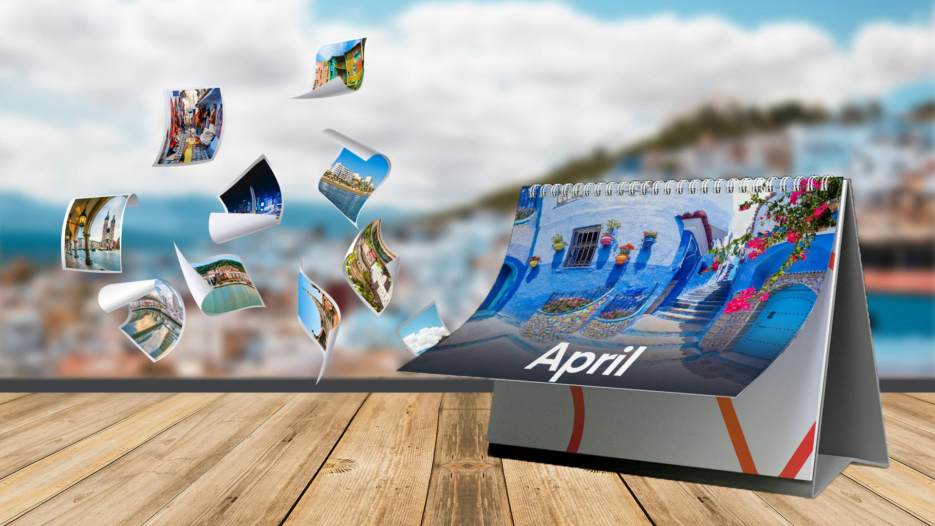 Fotos fliegen aus einem blauen Tischkalender mit einem Bild von Griechenland