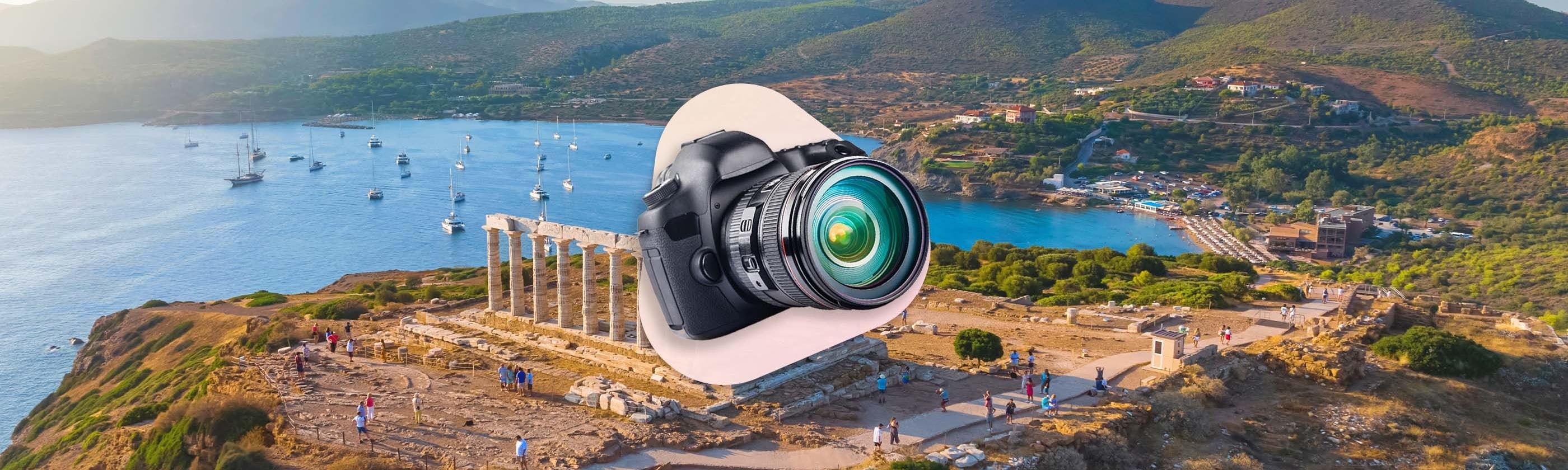 camera in front of a pink background in front of mountains and the sea