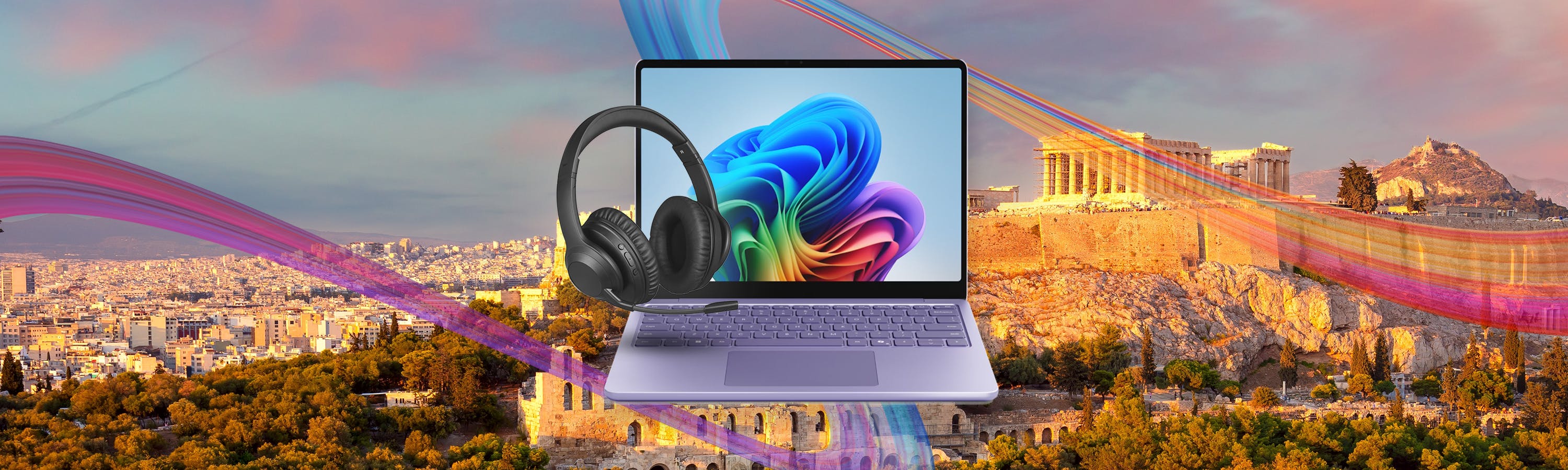 Laptop und Kopfhörer und im Hintergrund Athen