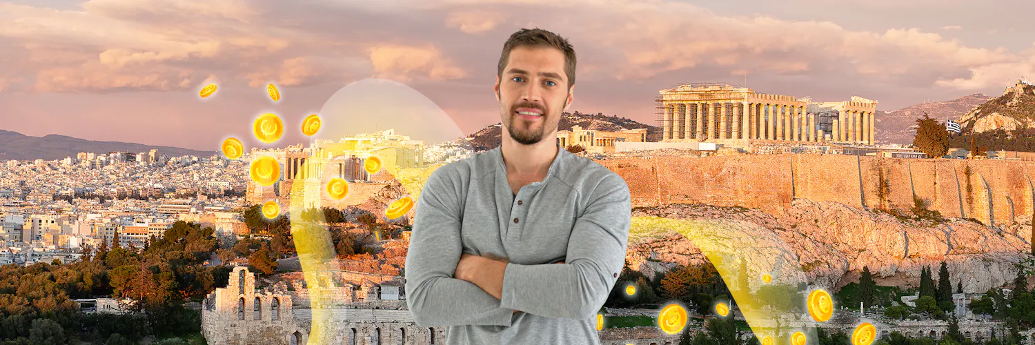 Mann neben Münzen vor der Acropolis