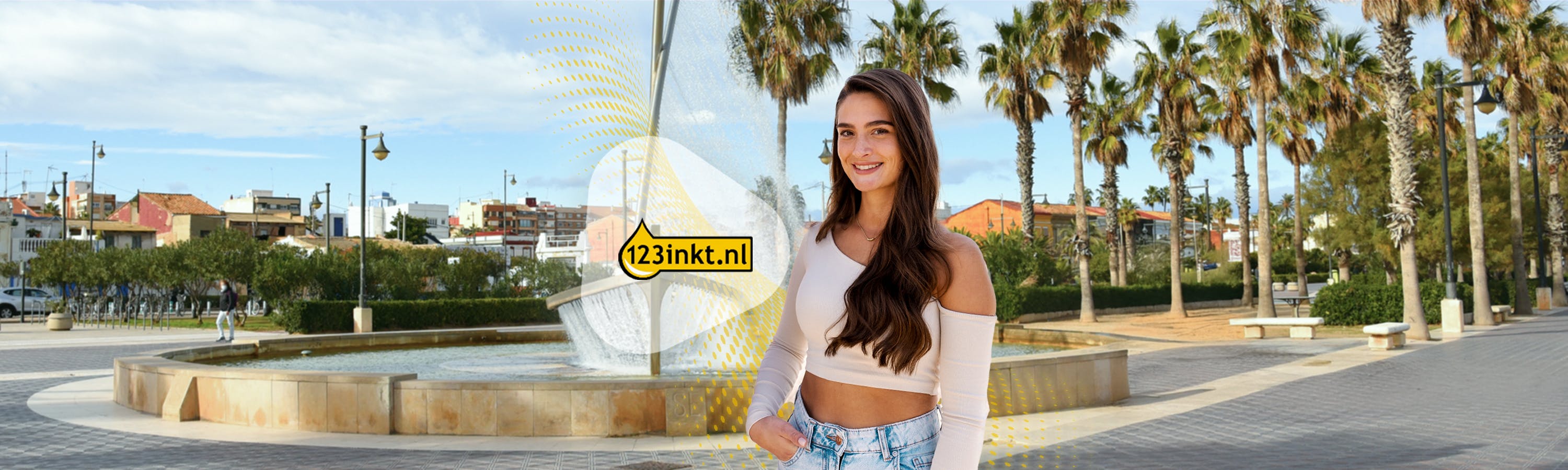 Girl next to 123ink logo with palm trees and a fountain in the background
