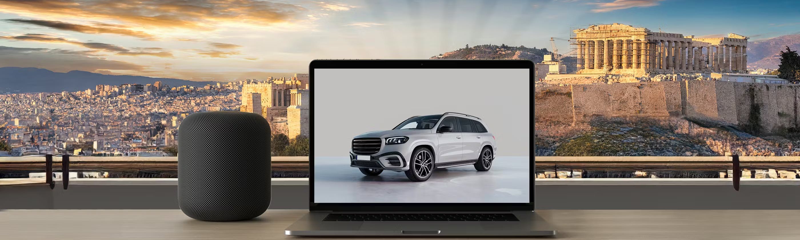 Laptop screen with white car next to a jukebox and Athens in the background